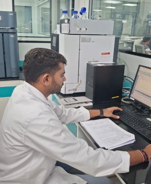 Senior Analytical Scientist Reviewing Chromatogram and Integration Data